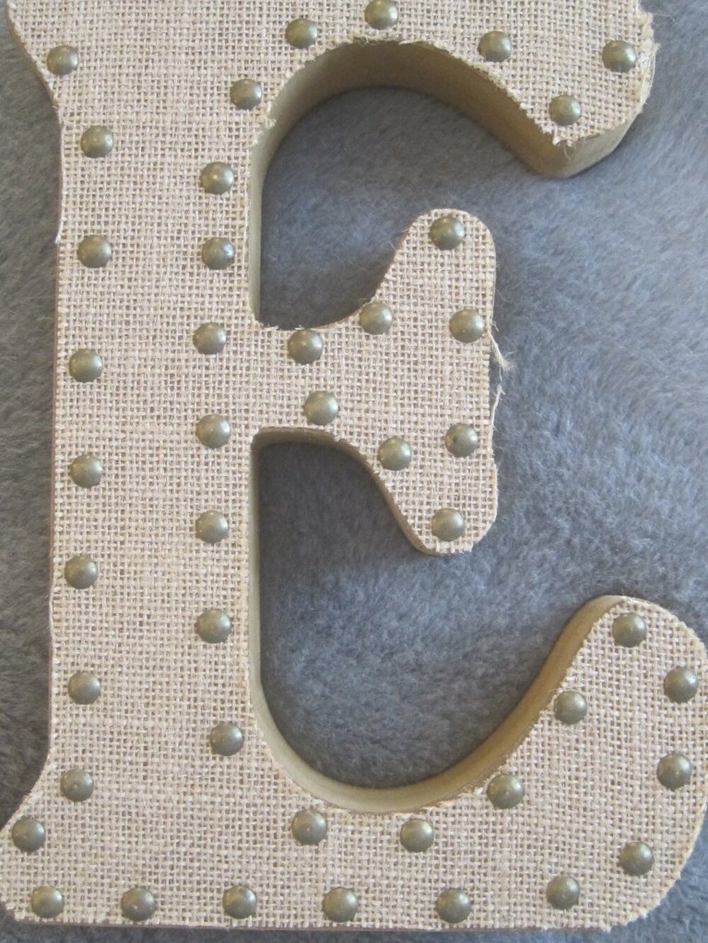 HOBBY LOBBY WOOD AND BURLAP LETTER "E" WITH BRASS STUD DETAIL